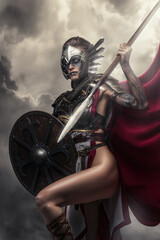 Portrait of warlike goddes dressed in armor and red cloak holding shield and spear.