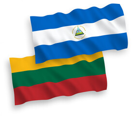 National vector fabric wave flags of Lithuania and Nicaragua isolated on white background. 1 to 2 proportion.