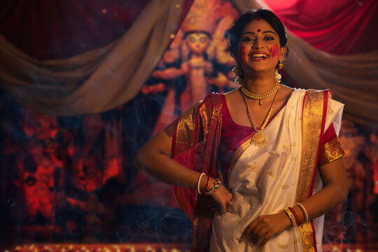 Portrait of a married Bengali woman with sindoor on face 