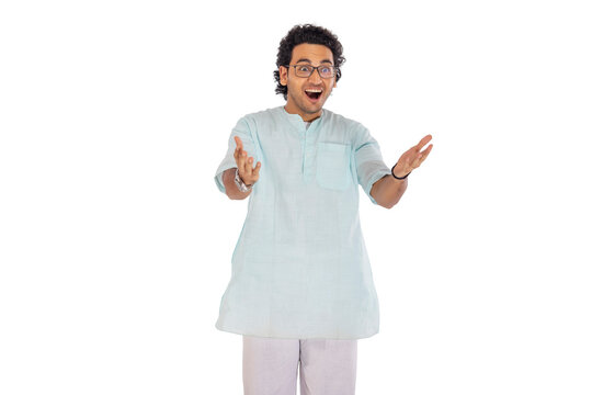 Portrait of a Bengali man gesturing against white background