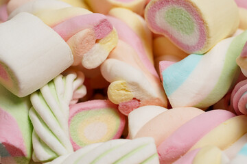 Multi-colored marshmallows. Background or texture of colorful blue and pink marshmallows.