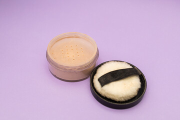 Facial Powder on Purple Background