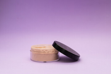 Facial Powder on Purple Background