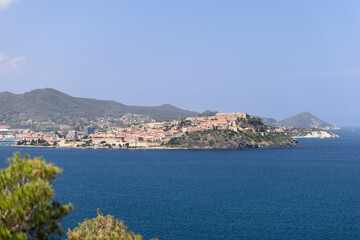 Fototapeta na wymiar Portoferraio is the capital and the main port of Elba Island and is located on the north-eastern coast, at the foot of a promontory that borders the bay, Province of Livorno, Italy