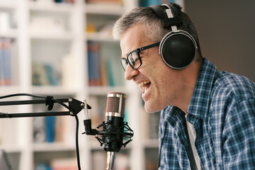 Professional speaker recording a live podcast