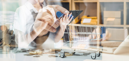 Portrait of Starting small businesses SME owners, two Asian woman check online orders Selling products working with boxs freelance work at home office, sme business online small medium enterprise