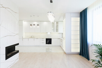 Naklejka na ściany i meble interior design of a kitchen with a black bio fireplace