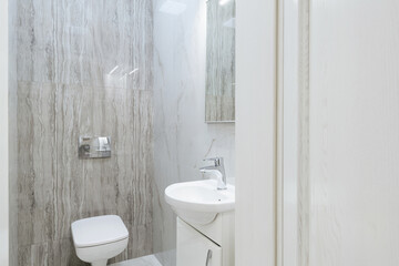 Naklejka na ściany i meble stylish bathroom interior design with tiles and lighting