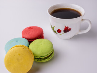 sweet French pasta on a white isolated background. flying falling sweet pasta