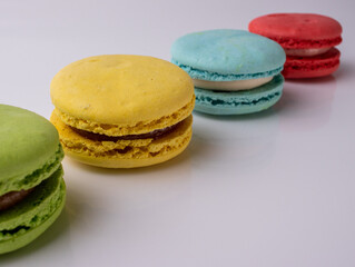 sweet French pasta on a white isolated background. flying falling sweet pasta
