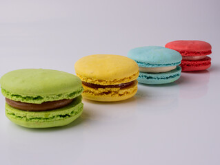 sweet French pasta on a white isolated background. flying falling sweet pasta