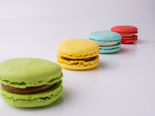 sweet French pasta on a white isolated background. flying falling sweet pasta