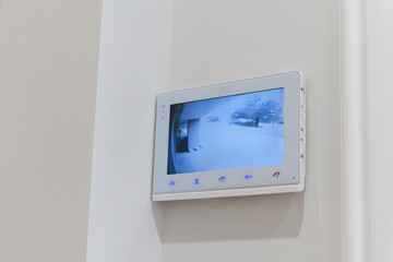 video monitor for surveillance cameras in the house on the wall