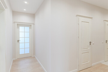 a large bright corridor in the new interior design of the house