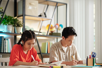 School Students Sitting at Desk
