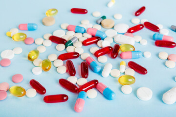 Many different colorful medication and pills perspective view. Set of many pills on colored background