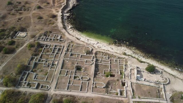 Chersones Sevastopol Crimea. Ruines of the ancient Greek city of Chersones. Archaeological excavations of an ancient structure. Aerial drone view Vladimir Cathedral and Chersonese Taurian, Crimea