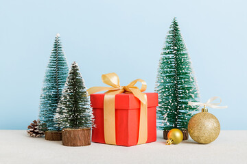 Christmas composition. craft Gift box, small tree, branches and craft DIY decorations on white background. New year concept. Christmas home decoration Flat lay, top view, copy space