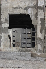 Closeup of destroyed buildings. Hashima Island old coal mines.