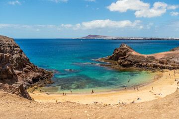 Beautiful Papagayo Beach with white sand and black rocks on Lanzarote, Canary Islands, Spain