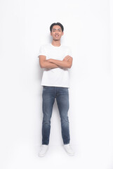 Handsome man in casual 
 t-shirt with arms crossed at studio shot isolated on white background
