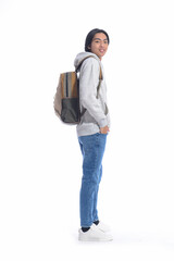 Full body young asian student in hoodie, jeans with backpack on white background