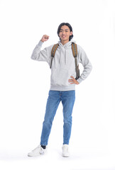 Full body young asian student with backpack  with winner gesture on white background