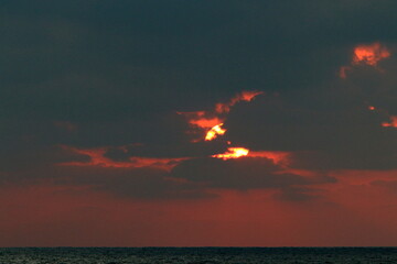 The sun sets below the horizon on the Mediterranean Sea in northern Israel.