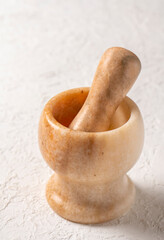 close-up shot of stone mortar on white background