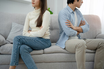 Divorce. Asian couples are desperate and disappointed after marriage. Husband and wife are sad, upset and frustrated after quarrels. distrust, love problems, betrayals. family problem, teenage love