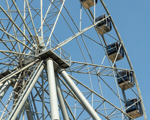 Part of the design of the Ferris wheel with booths.