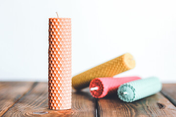 Wax decorative candles. Honeycomb candles. Candles on a clean background