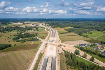 Drone photo of building site of express road S7, view in Ruda village near Tarczyn in Poland