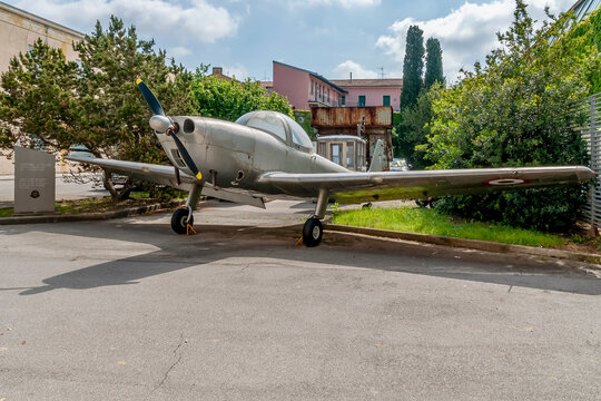 The two-seater aerobatic training aircraft, P148, designed by Corradino d'Ascanio and placed at the entrance to the Piaggio Museum in Pontedera, Pisa, Italy