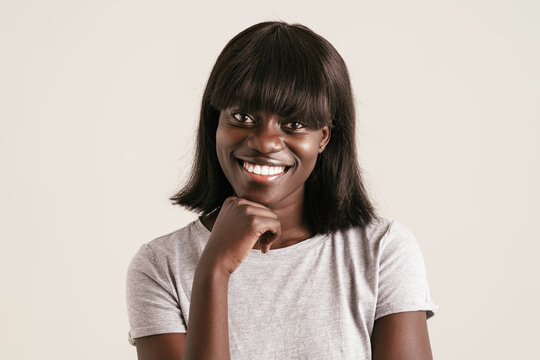 Portrait Of Young Beautiful Smiling African Woman With Bob Haircut