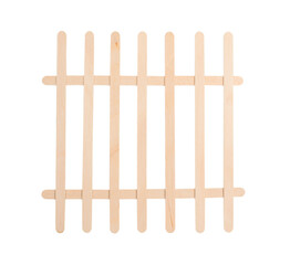 Fence made of wooden lolly or ice-cream sticks isolated.