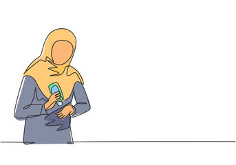 Continuous one line drawing a woman wearing a hijab pours hand sanitizer into her palms to avoid bacteria and be more hygienic. Protection against covid-19. Single line draw design vector illustration