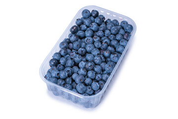 Blueberries in a plastic container isolated on white background.
