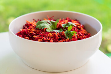 beet and carrot salad in a white salad bowl, Majorca, Balearic Islands, Spain