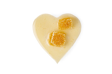 Honey on honeycomb in a heart isolated on white background. Natural honey, organic bee product with clipping path.