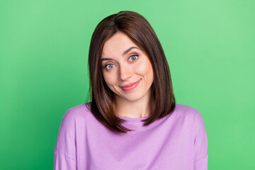 Obraz premium Closeup photo of young gorgeous funny woman smiling ignore you have low salary isolated on green color background
