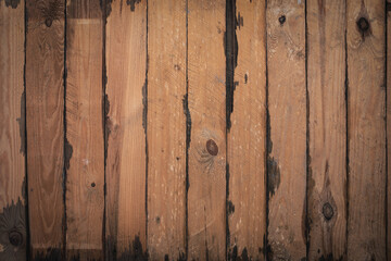 Weathered wooden planks background. Wooden surface with nature pattern. Top view on bright brown...