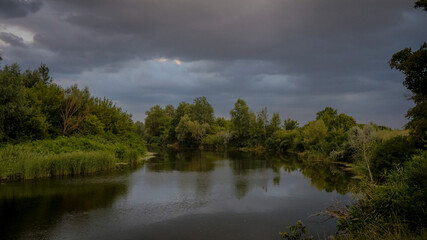 landscape before a storm. sky with thunderclouds. wallpaper. backgrounds. nature. macro. textures