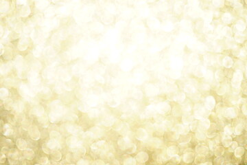 Shiny light blurred gold background with round bubbles