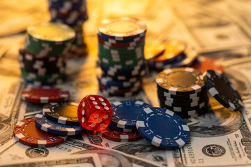 Poker cards royal flush, cash money dollar bills. Gambling, casino chips, dices. Casino tokens, gaming chips, checks, or cheques on green table in casino club