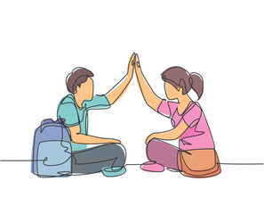 One line drawing of young happy couple male and female sitting on the floor and giving high five gesture. Relationship concept continuous line draw design graphic vector illustration