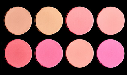 Powder makeup on black background. Makeup colour palette in circular shapes. 