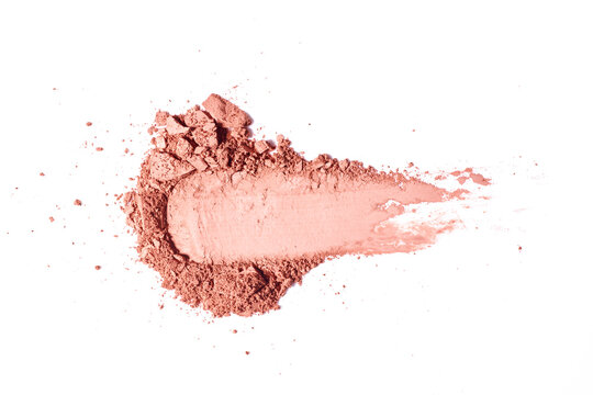 Powder makeup on white background. Texture of makeup powder smear isolated on solid background. Texture swatch or sample. 