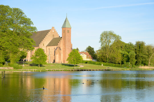 Maribo Cathedral seen across the lake S&oslash;nders&oslash;