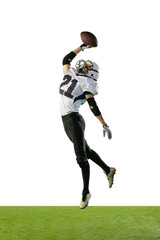 Full-length portrait of professional american football player in uniform training, jumping isolated over white background